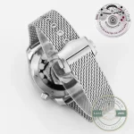 Laser-engraved wave pattern in broad shallow lines across the blue Seamaster clone dial