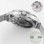Conical helium escape valve at ten o'clock blending into the Seamaster clone case