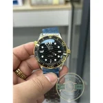 Matching two-tone bracelet of the superclone Omega Seamaster Diver 300M, steel paired with gold