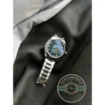 Integrated stainless steel bracelet links flowing straight off the case, super clone Aqua Terra