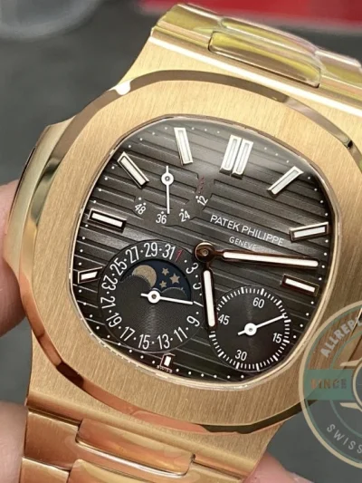 Superclone Patek Philippe Nautilus Moon phases 40 mm, Gold, Dark Dial, 5712/1A - Best Quality Replica Watch