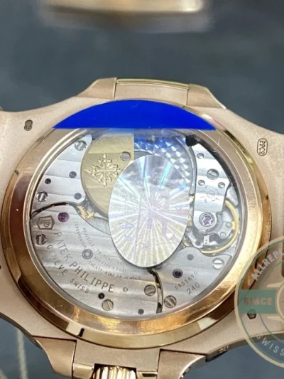 Superclone Patek Philippe Nautilus Moon phases 40 mm, Gold, Dark Dial, 5712/1A - High-Grade Replica Watch