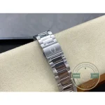 Central seconds hand rather than a sub-dial keeps the superclone Aqua Terra calendar dial clean