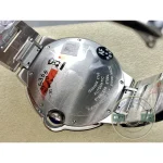 Hands in blued steel are the single accent of colour on this dial
