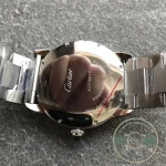 Caseback engraving reading automatic, bracelet ends clamped either side