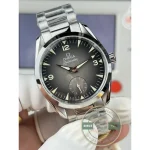 Clone Omega Railmaster broad arrow handset reaching across the brushed grey dial