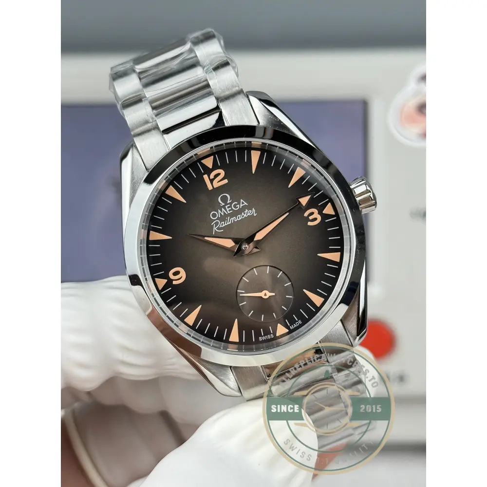 Clone Omega Railmaster brown dial shifting between chocolate and bronze with the light angle