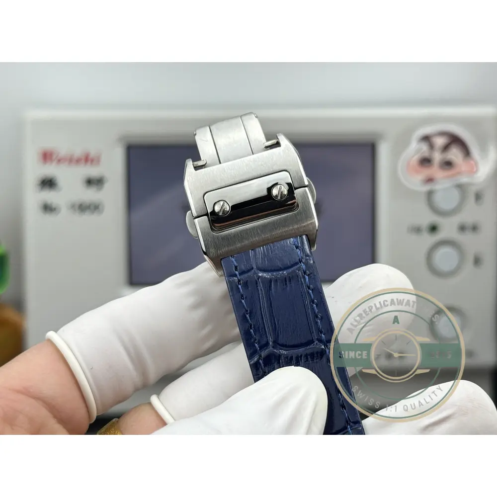 Blue alligator strap opened out with its steel folding clasp at the end