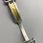Flyback chronograph, resetting and restarting on a single press