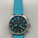 Petronas teal printed on the outer minute track, lifted from the Formula One livery