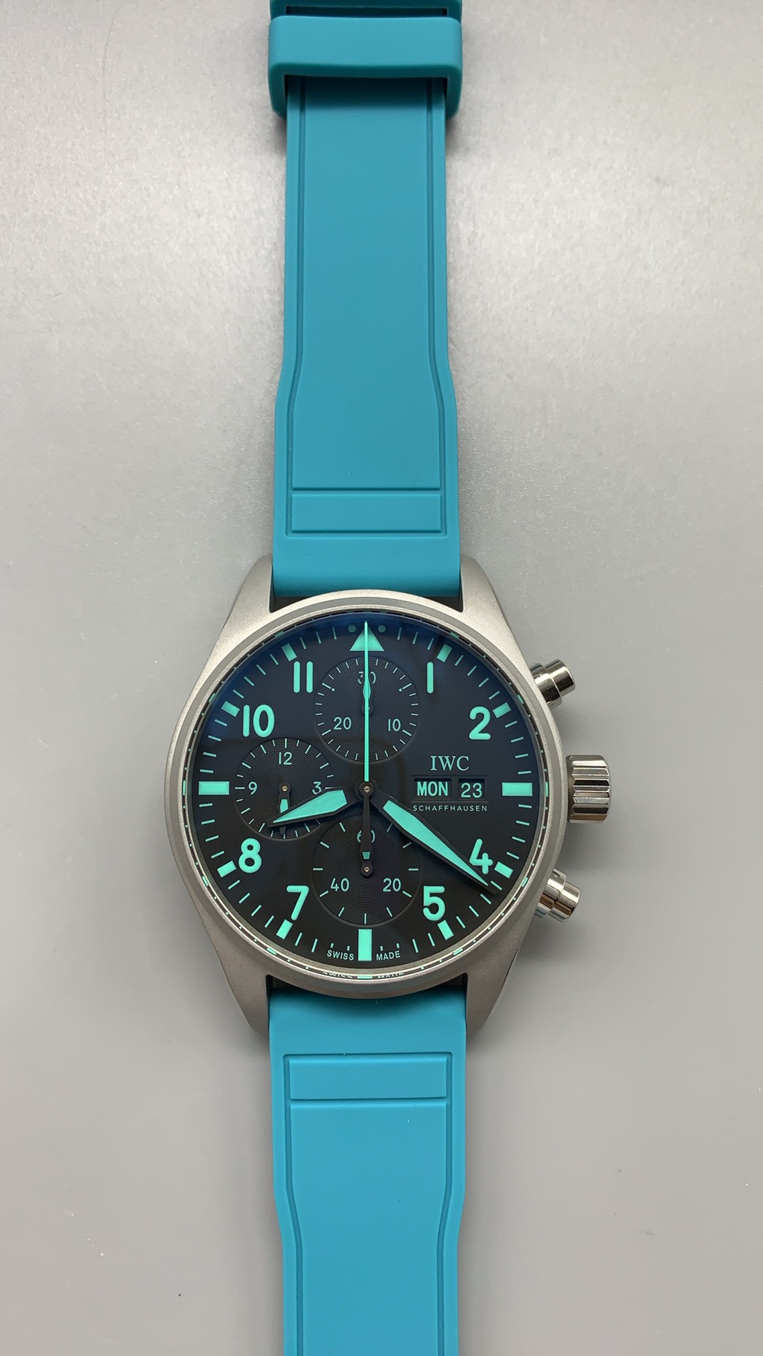 Petronas teal printed on the outer minute track, lifted from the Formula One livery