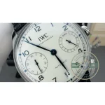 Against the silver dial, a blue alligator strap on a steel folding clasp