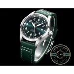 Oversized Arabic numerals printed across the green Mark XX clone dial