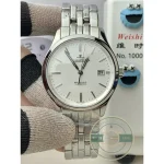 Thin central seconds hand parked exactly on a minute stroke, as deadbeat seconds do