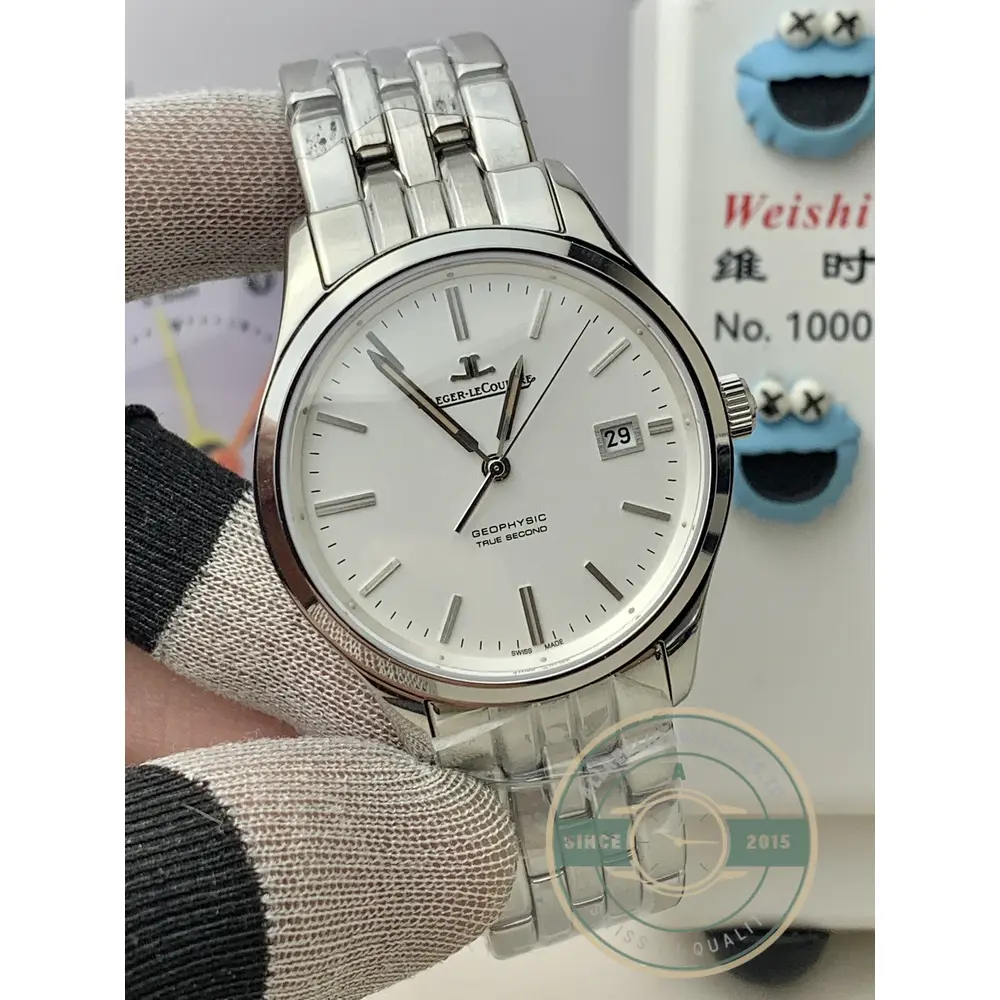 Date aperture at three with the disc colour matched to the silvered dial
