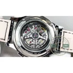 Applied steel Arabic 6 above the clean lower dial where no date window breaks the lacquer