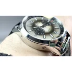 Skeletonised hour and minute hands letting grey lacquer show through the openworked centre