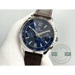 Polished steel bezel ringing the blue dial above the brushed mid-case