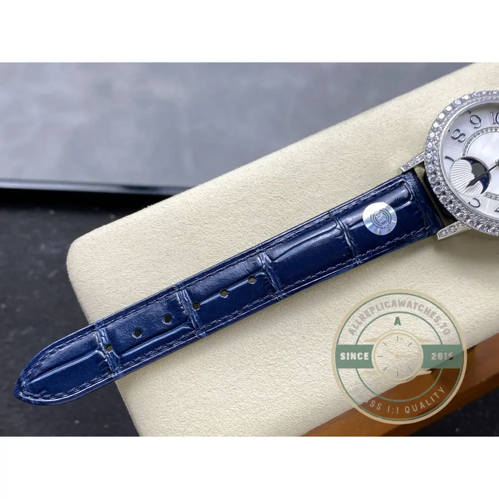 Strap laid flat on the cushion with the diamond-set lug entering the frame