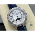 Angled close-up of the mother-of-pearl dial and the moon disc on its star field