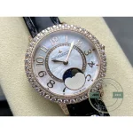Angled close-up of the mother-of-pearl dial under the double row of brilliants