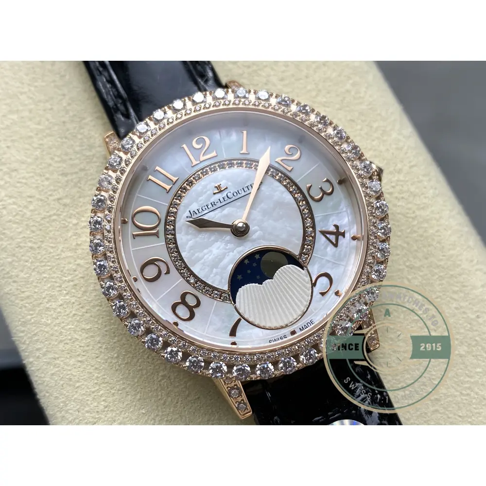 Angled close-up of the mother-of-pearl dial under the double row of brilliants