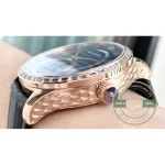Baguette cut stones set the whole way around the pink gold bezel