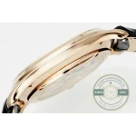 Applied gold baton markers and matching hands across the eggshell dial of the Q1372510