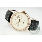 Radial date at 2 o'clock, the hand crossing a printed arc of numerals instead of a window
