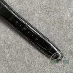 A transparent sapphire display back over the calendar disc assembly
