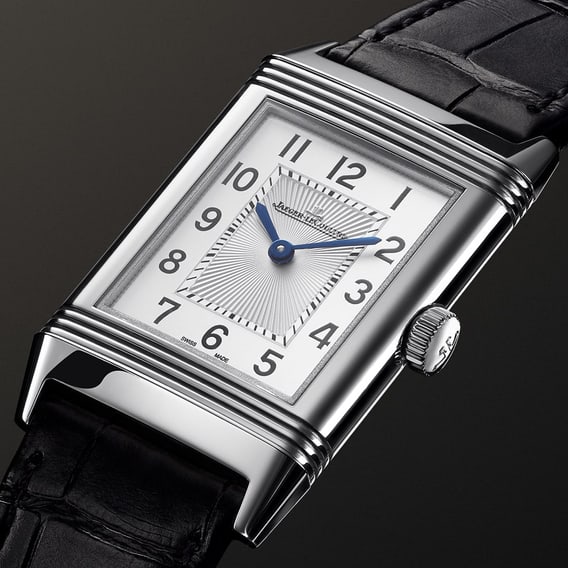 Jaeger-LeCoultre Reverso luxury watch closeup showing the iconic rectangular case and Art Deco design