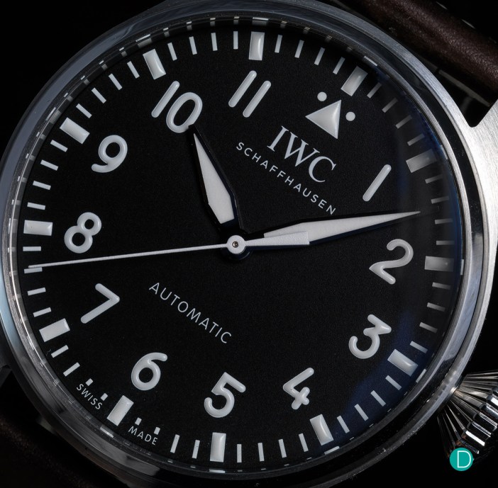 IWC Big Pilot replica dial closeup showing Arabic numerals and lume