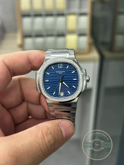 Nautilus 7118/1200A-001 Patek Philippe “Ladies Automatic”. 35.2 mm, Steel, Blue Dial