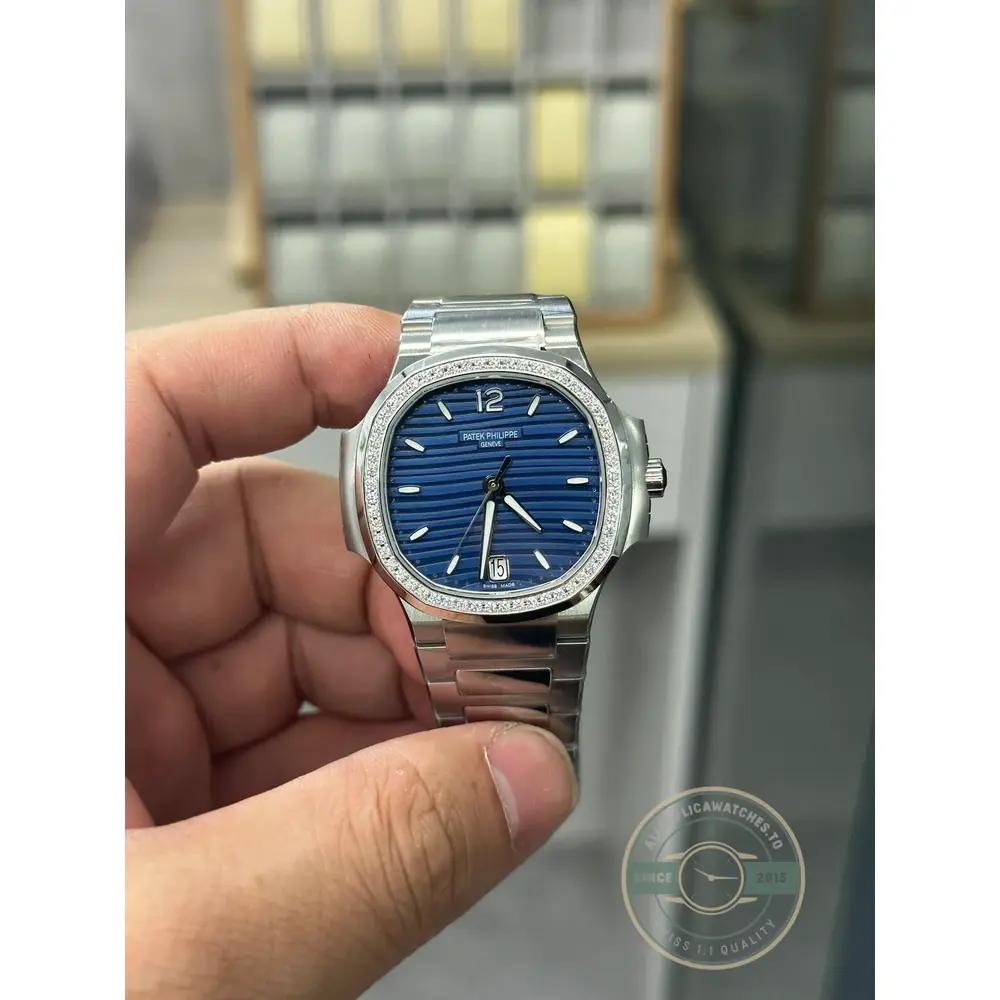 Nautilus 7118/1200A-001 Patek Philippe “Ladies Automatic”. 35.2 mm, Steel, Blue Dial