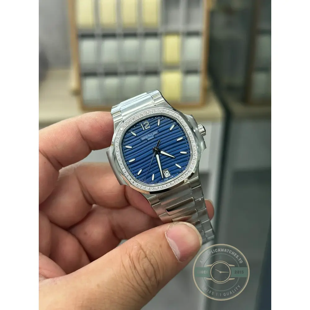 Nautilus 7118/1200A-001 Patek Philippe “Ladies Automatic”. 35.2 mm, Steel, Blue Dial