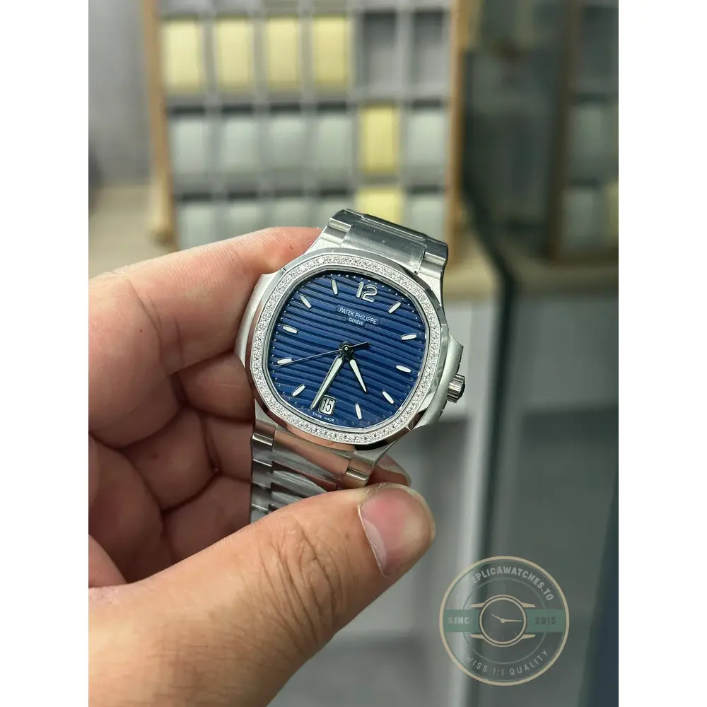 Nautilus 7118/1200A-001 Patek Philippe “Ladies Automatic”. 35.2 mm, Steel, Blue Dial