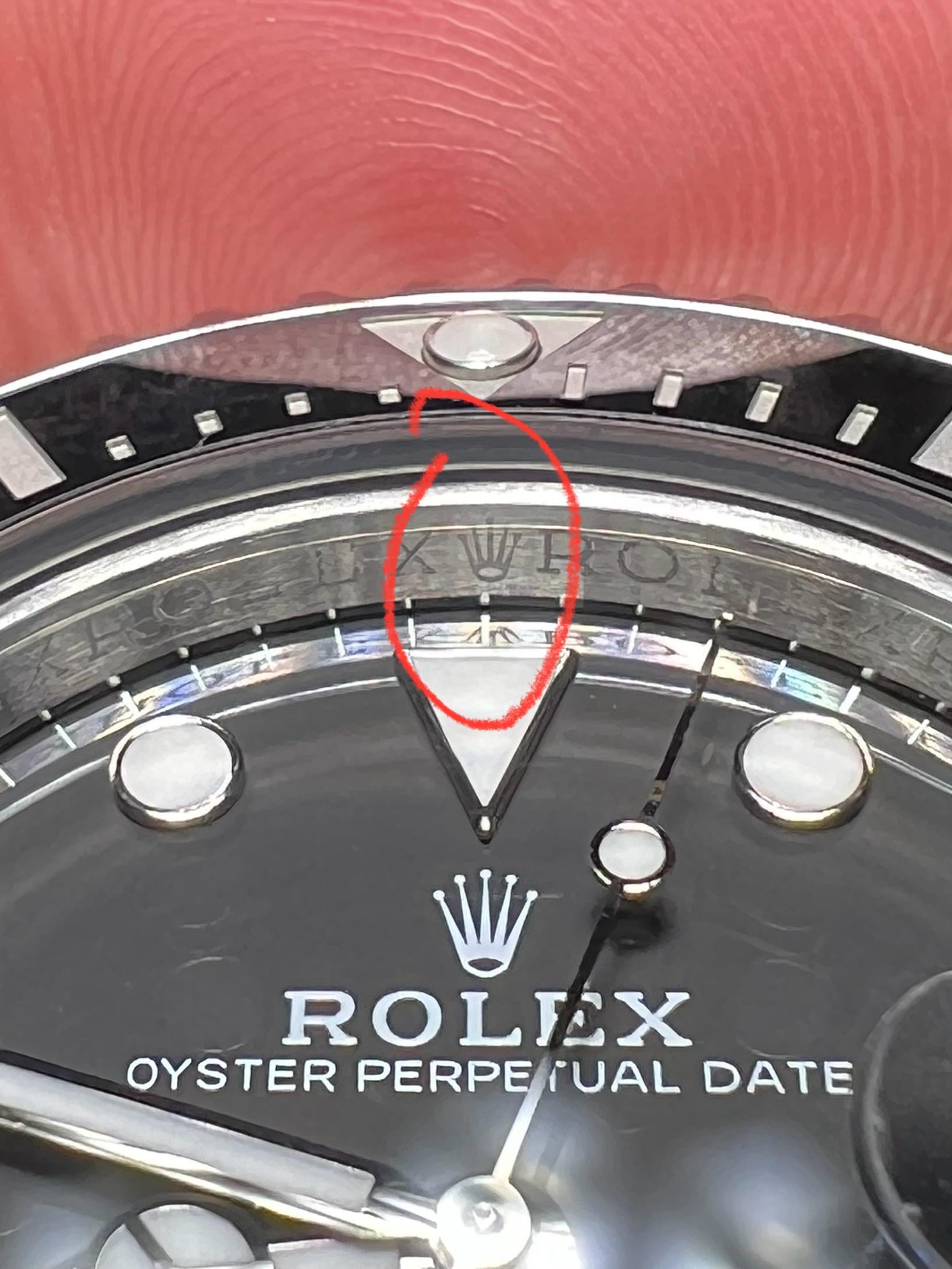 Watch dial alignment verification close-up