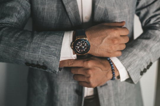 Man wearing luxury watch daily