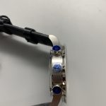 A folding clasp holds the black alligator to this 41mm chronograph