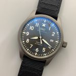 Brushed grey dial of the Patrouille Suisse replica under coated sapphire