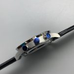 Gold-tone Arabic numerals complete the white dial and blue hand pairing
