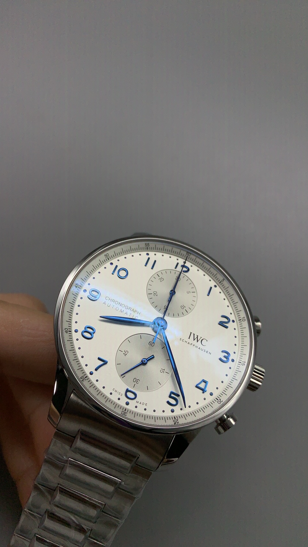 The dial turns a different shade of silver with each viewing angle