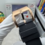 Screw-in crown sealing the gold case, rated to 100 metres of water resistance