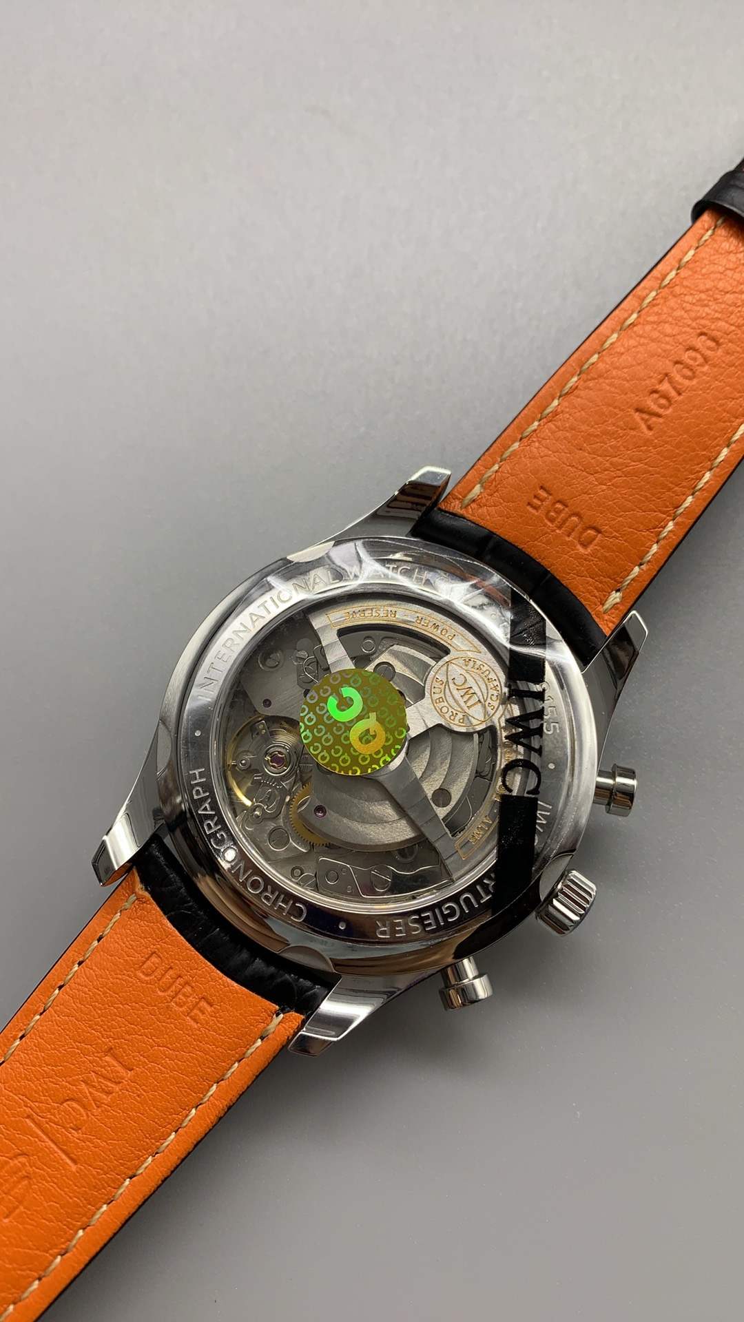 Silver subdials with circular graining set into the steel blue dial
