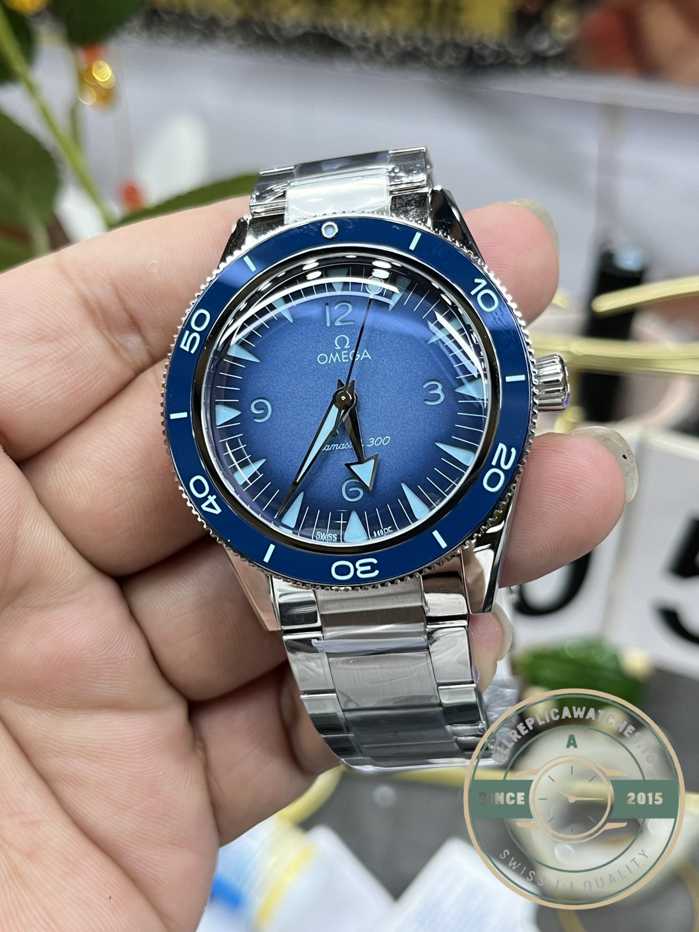 VSF assembled the movement in this replica Omega Seamaster 300 with its blue 41mm dial