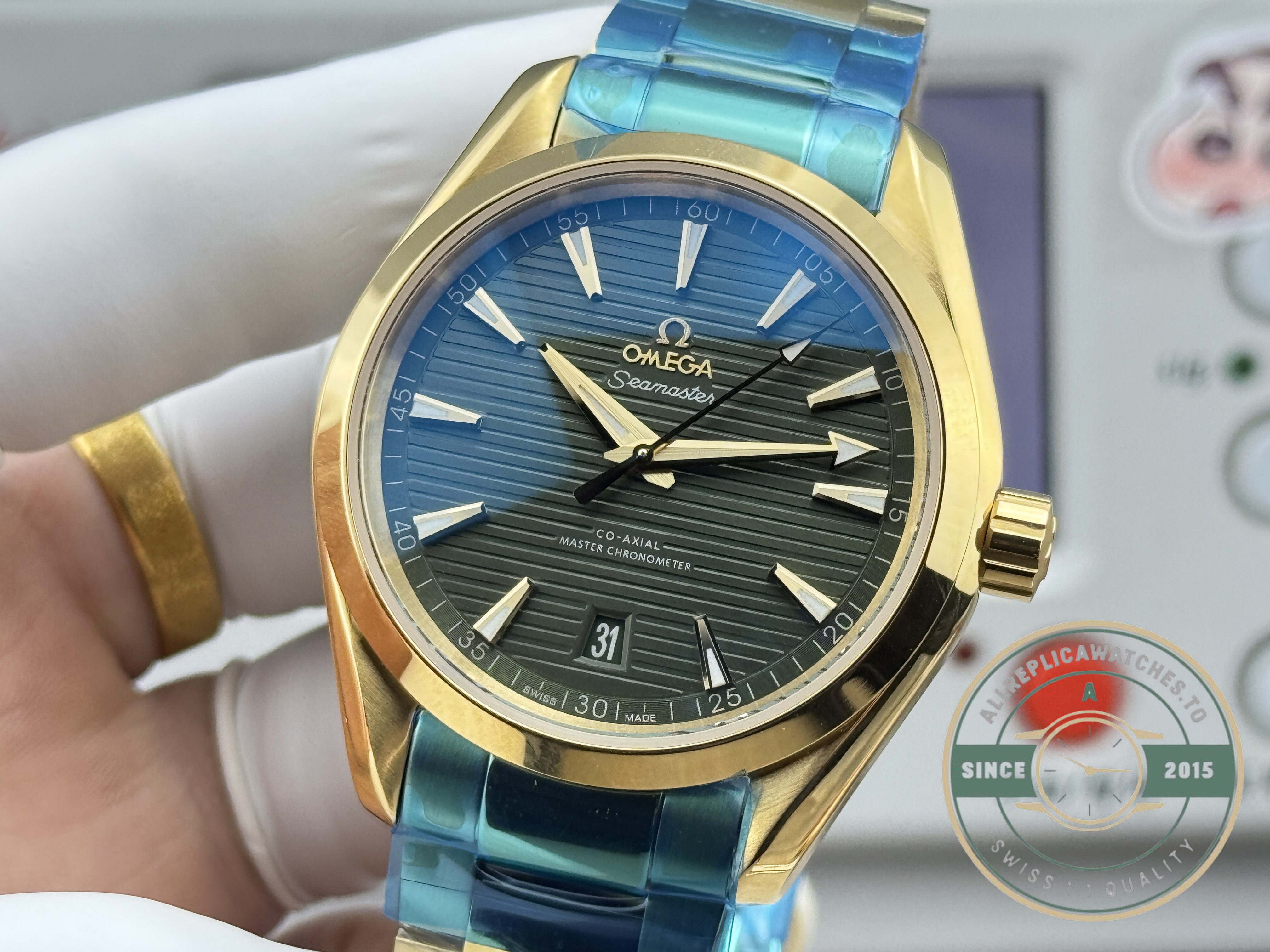 18K gold treatment on an Omega Seamaster Aqua Terra 150M clone, the dressier end of the line