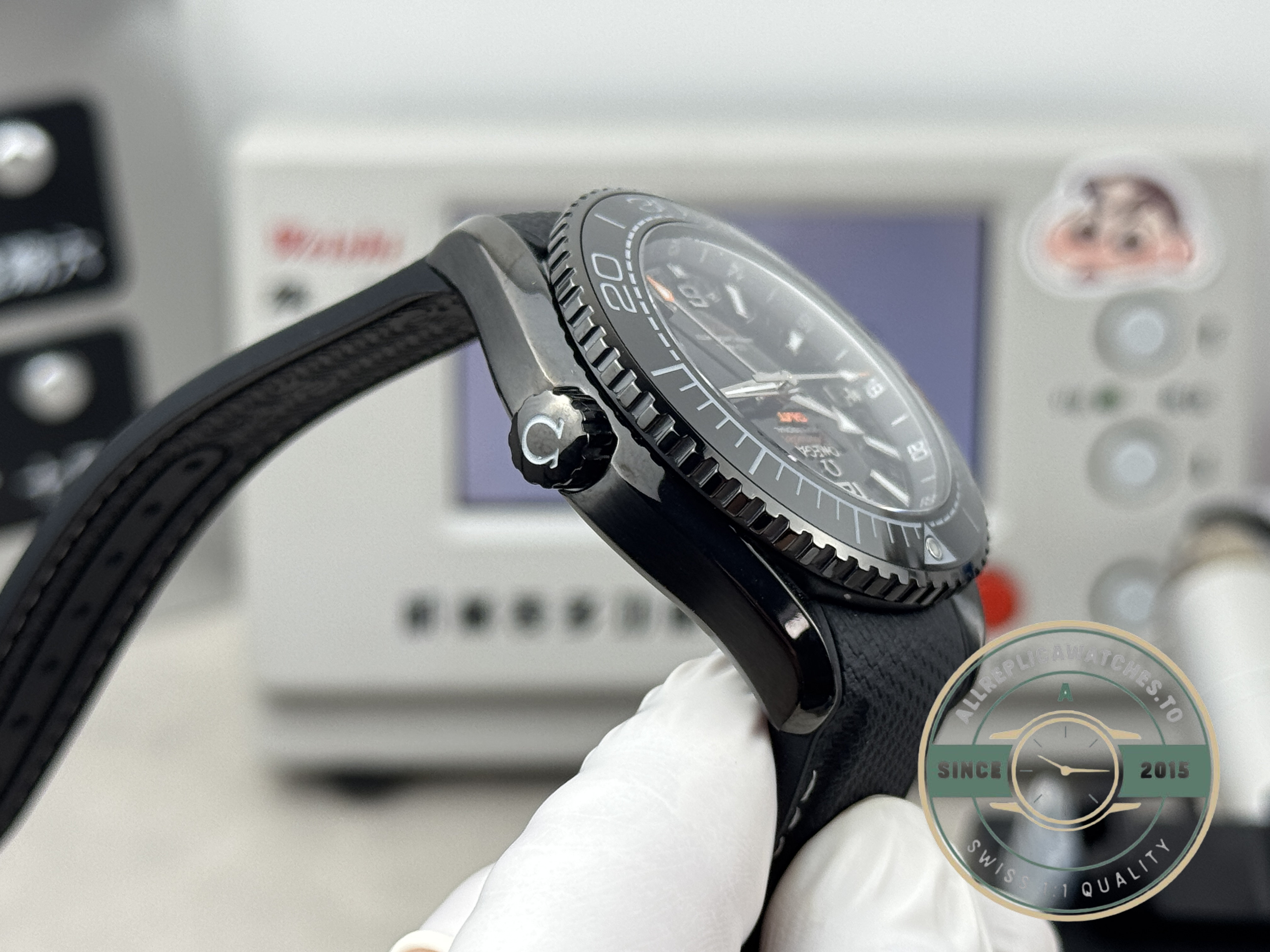 Screw-down crown with rubber grip set into the ceramic flank, clone Omega Planet Ocean Deep Black