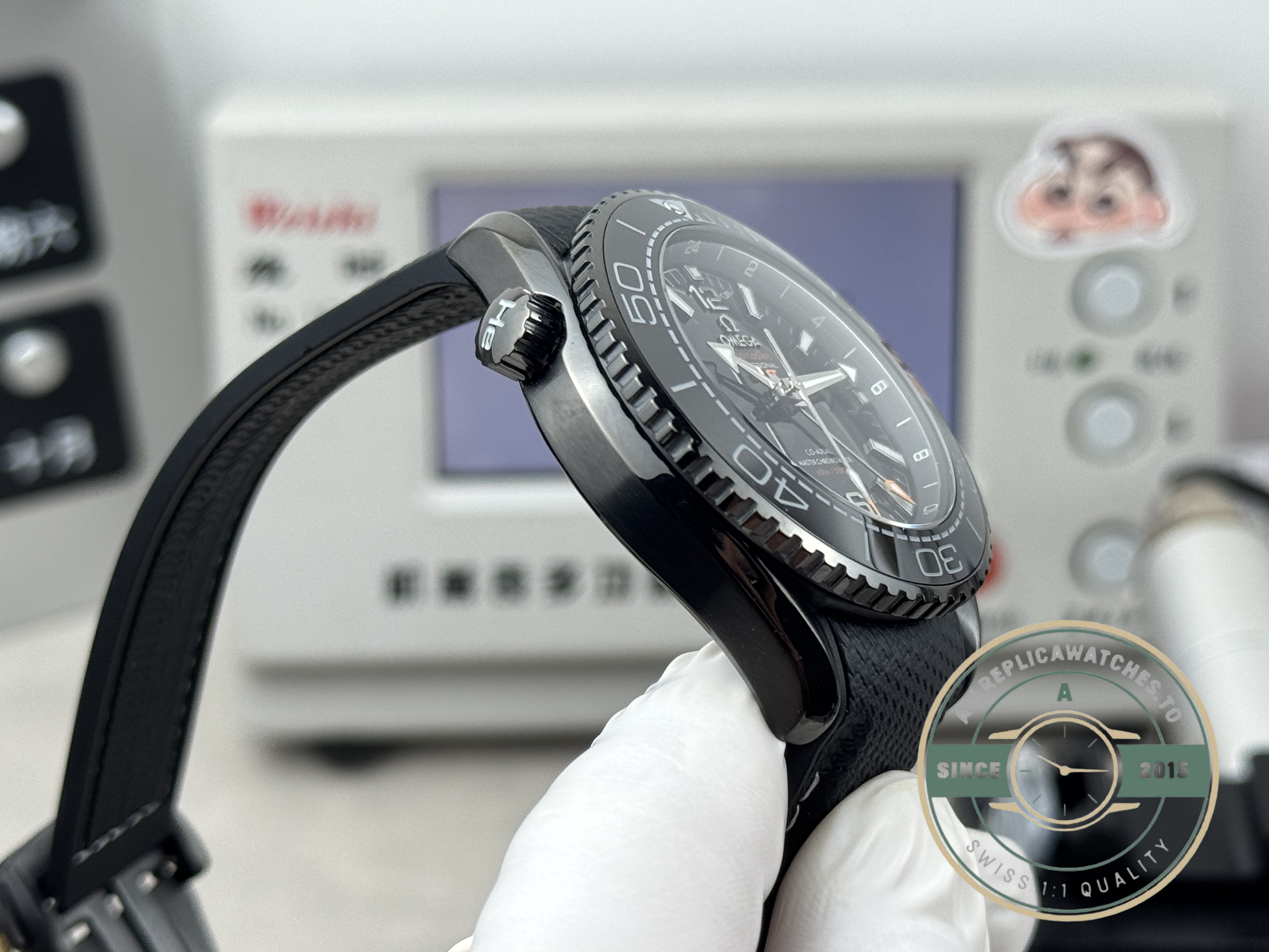 Integrated black rubber strap running straight off the ceramic case, replica Omega Planet Ocean