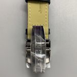 Wrist shot showing the 45.6 x 27.4 mm rectangular case footprint with the strap fastened