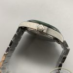 Replica Omega Aqua Terra Worldtimer 43mm case shown in profile against the world time dial